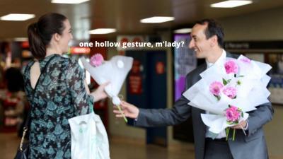 Elected MP Dave Sharma Was Utterly Roasted For Using IWD To Hand Out Flowers To Random Women