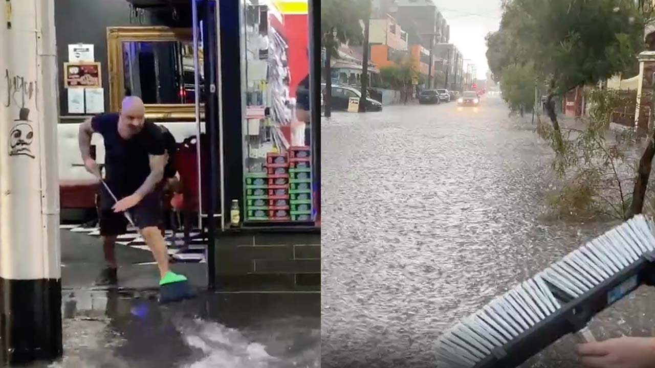 A Pat On The Back To These Blokes Who Brought A Broom To Clean Up Melb’s Poopy Flood Water