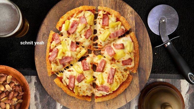 Pizza Hut Has Made Pizzys With A Whole Schnitzel As The Base In A Move Of Pure Crumbed Chaos