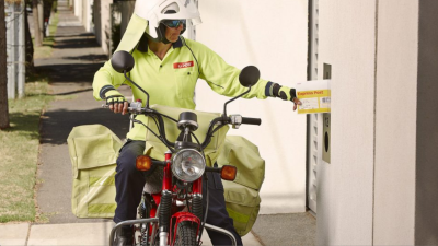 Postie Bikes Are So 2000-And-Late And Will Soon Be Replaced By Electric Neon Three-Wheeled Pods