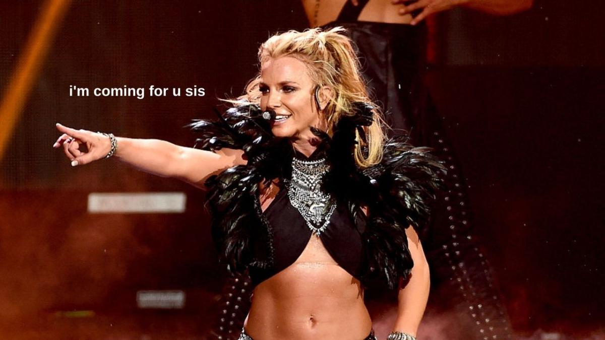 Britney Spears pointing with a caption that says "I'm coming for you sis."