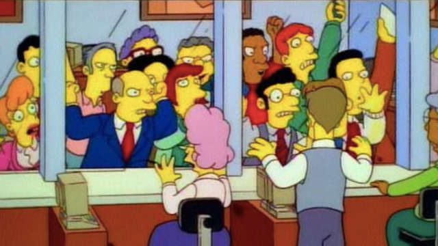 Still from the Simpsons showing people rioting outside a bank, banging on glass at teller windows