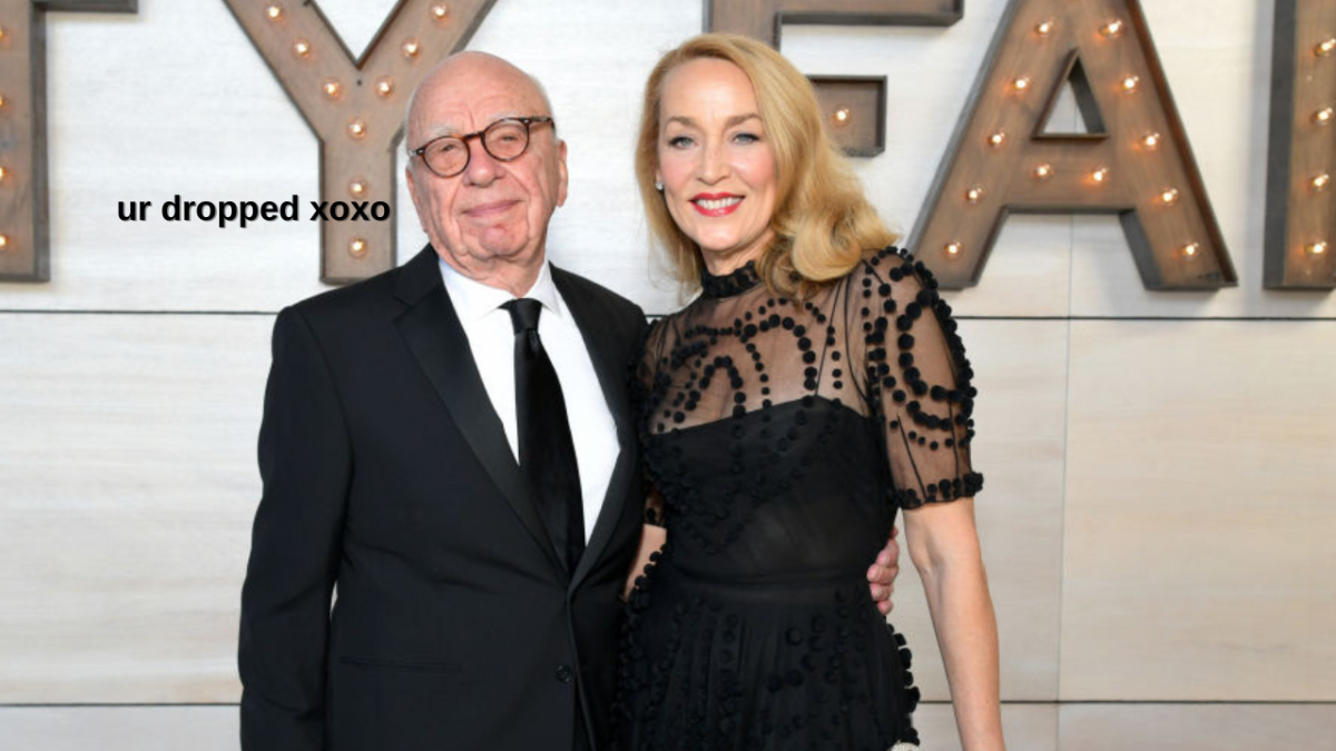 Rupert Murdoch and Jerry Hall at the 2019 Vanity Fair Oscar Party with text reading "ur dropped xoxo" overlaid