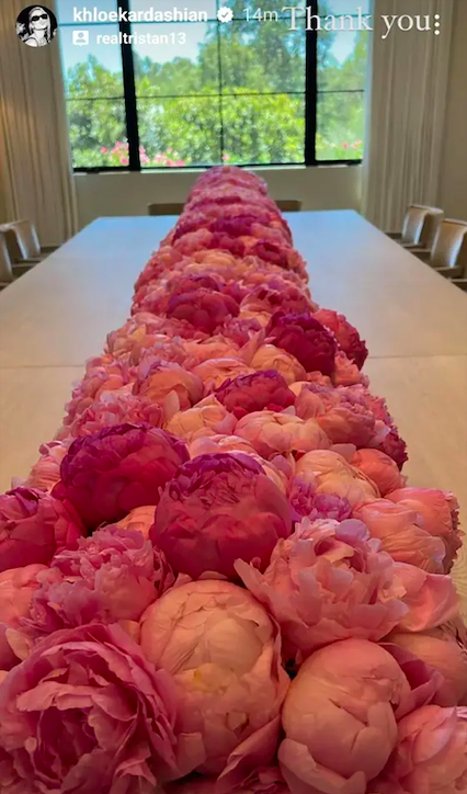 pink peonies on a table uploaded by Khloe Kardashian on Instagram