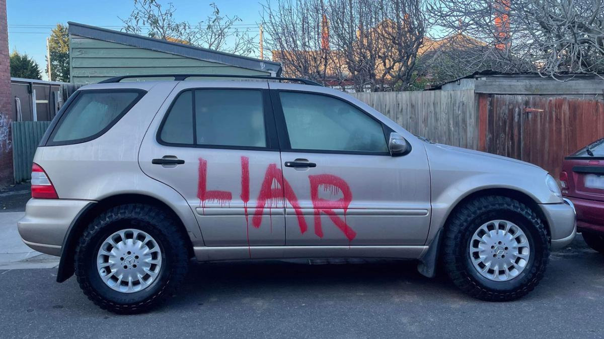 melbourne car graffitied cheater liar