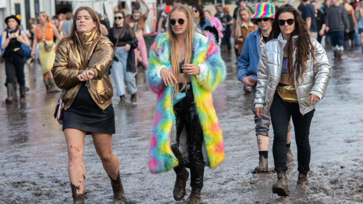 Festival goers at Splendour In The Grass 2022 in Byron Bay trudging through mud