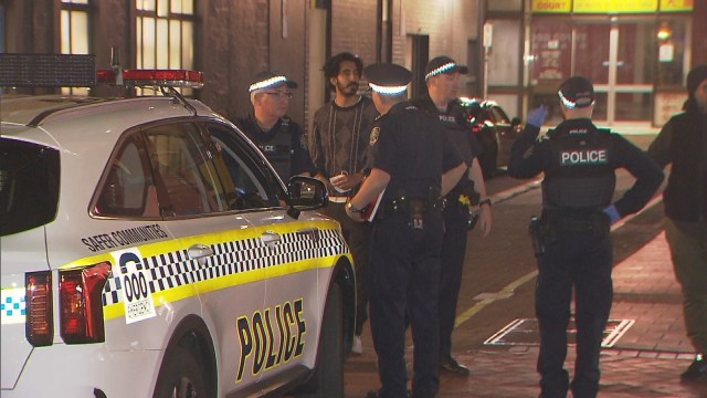 British actor Dev Patel speaking to South Australia police after witnessing a stabbing in Adelaide