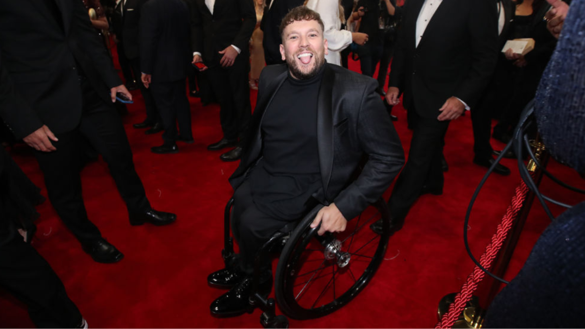 Dylan Alcott in a black suit on the 62nd TV Week Logie Awards red carpet