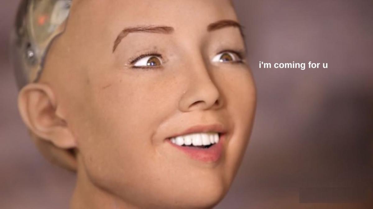 women are more likely to be replaced by automation. pic is a female robot grinning with the caption: "I'm coming for you"