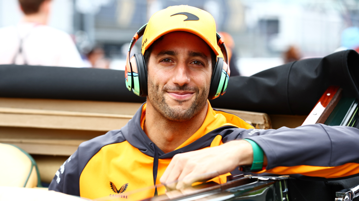 Daniel Ricciardo of Australia and McLaren looks on from the drivers parade prior to the F1 Grand Prix of Japan at Suzuka International Racing Course