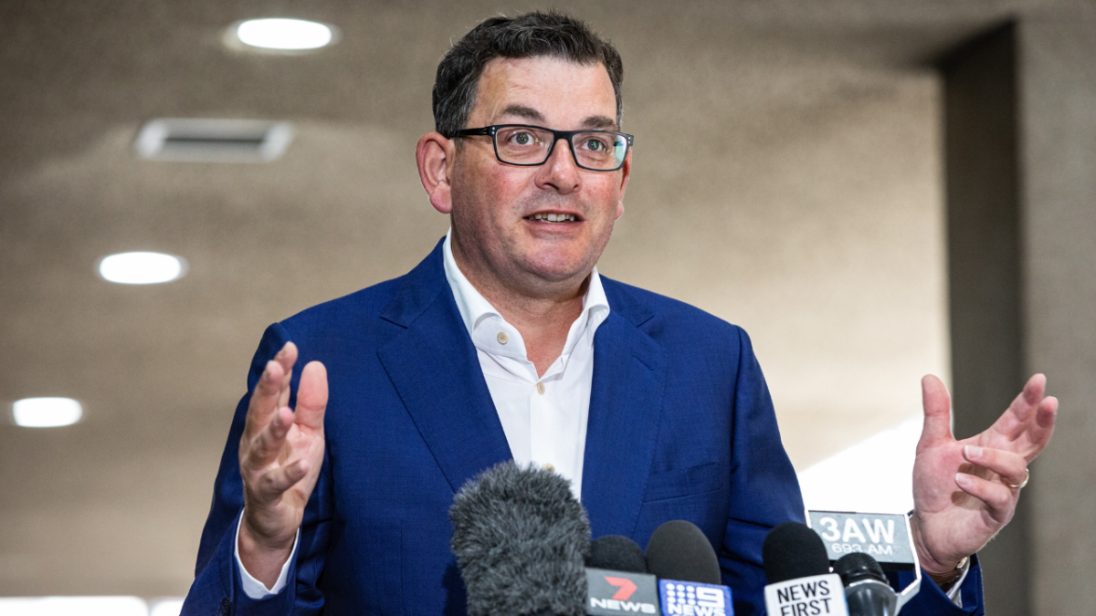 Victorian Premier Daniel Andrews speaking at Covid-19 press conference in blue suit