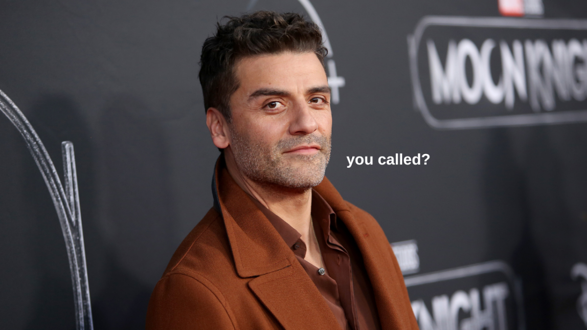 Oscar Isaac attends the Moon Knight Los Angeles Special Launch Event, pulling a smouldering gaze in a tan coat and saying "you called?"