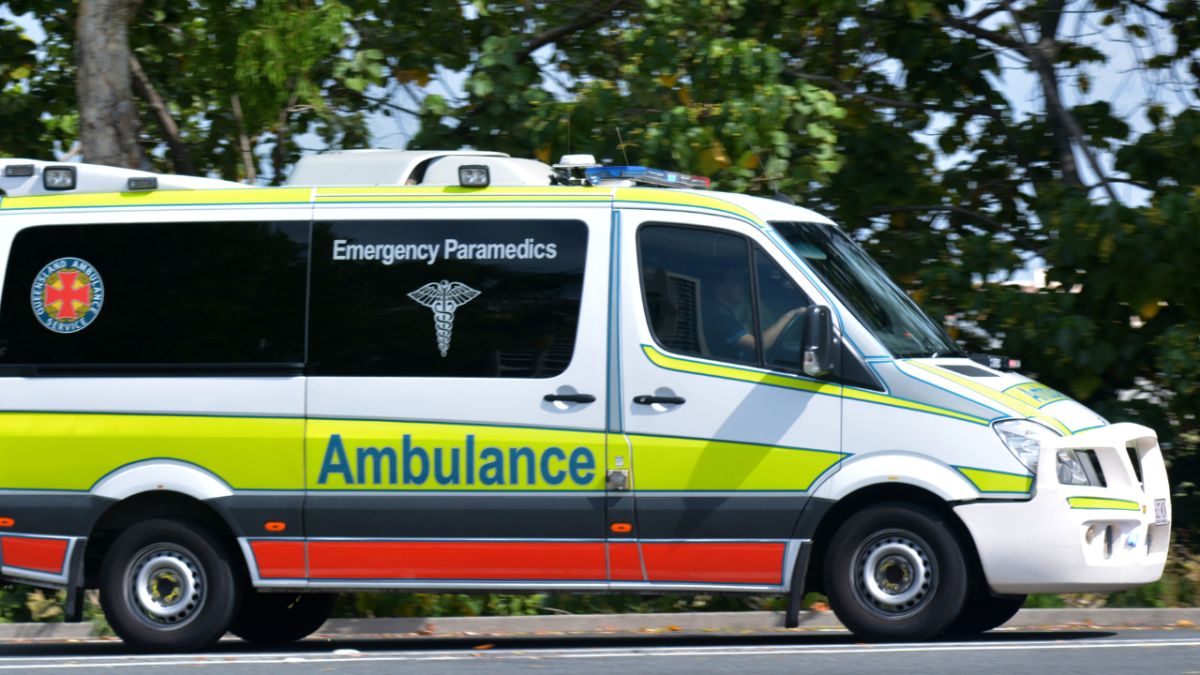 Ambulance in Queensland driving down road