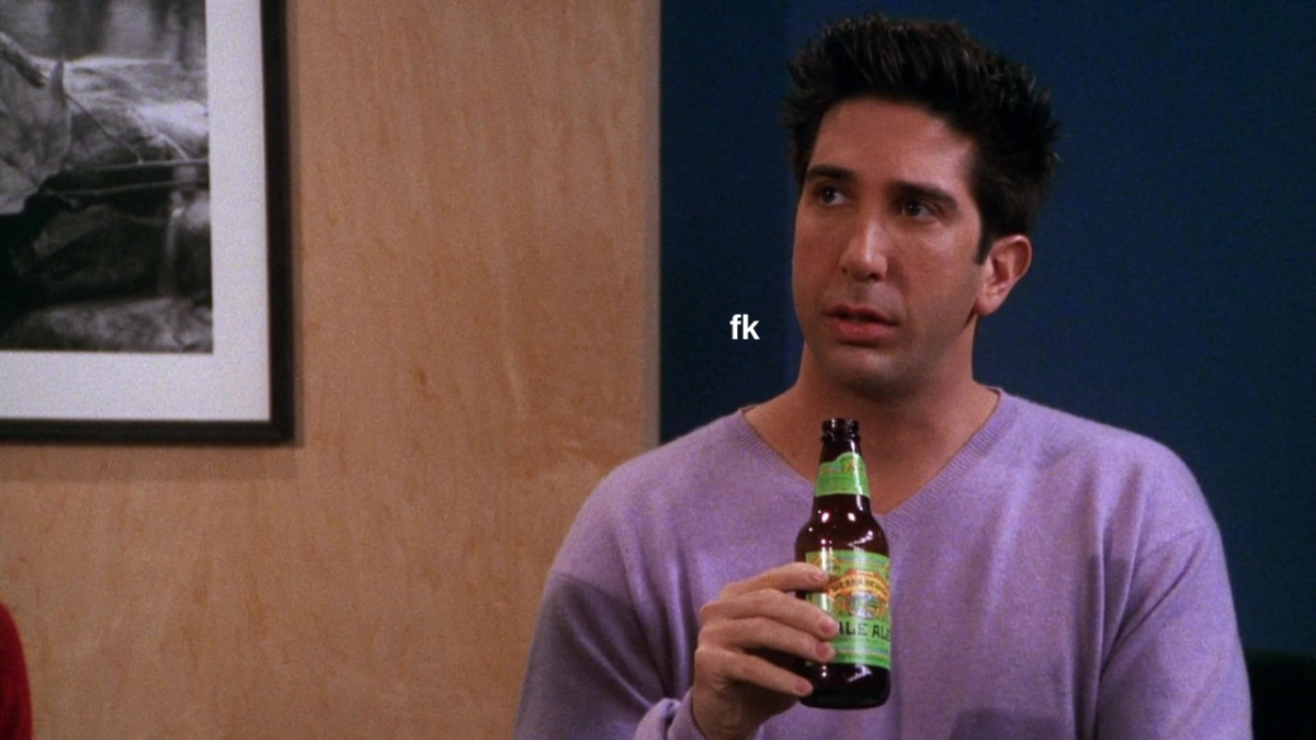 ross geller on friends drinking a beer in a pink shirt saying "fk"