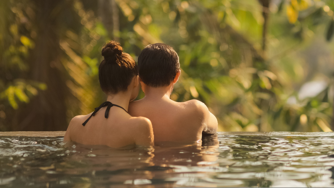 A couple in a pool in Indonesia