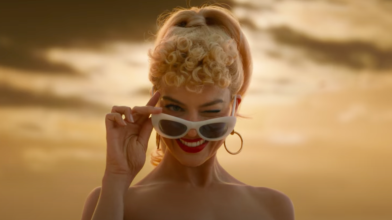 The Barbie Teaser Trailer Has Officially Dropped & Margot’s Wink Is The New Thanos Snap