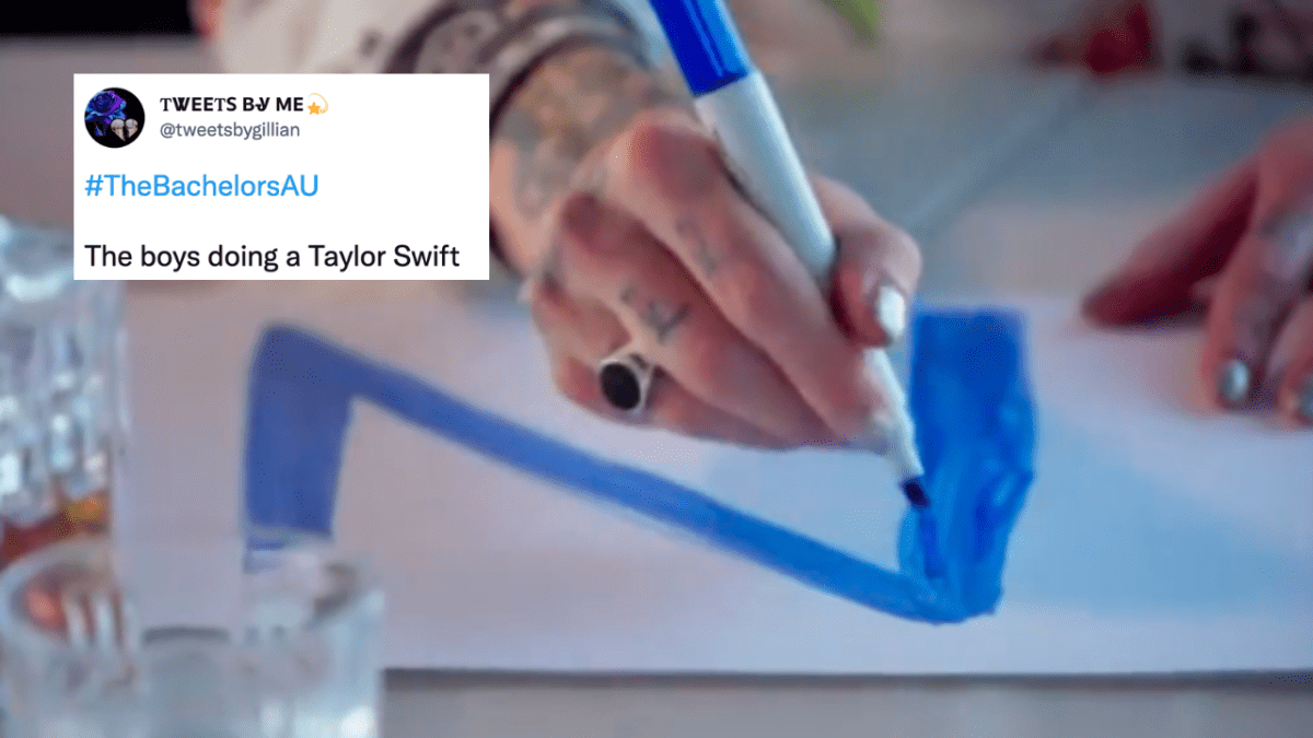 Jed on The Bachelors drawing the letter N on a piece of paper in blue texta with a tweet overlaid which reads: The boys doing a Taylor Swift