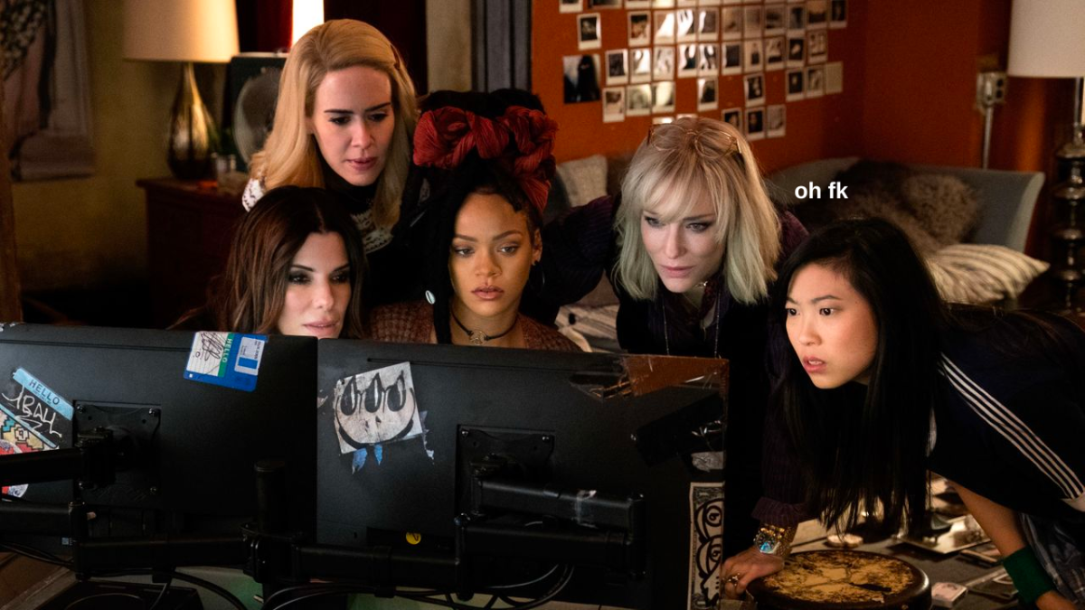 Scene from Ocean's 8 where characters are planning heist on computer