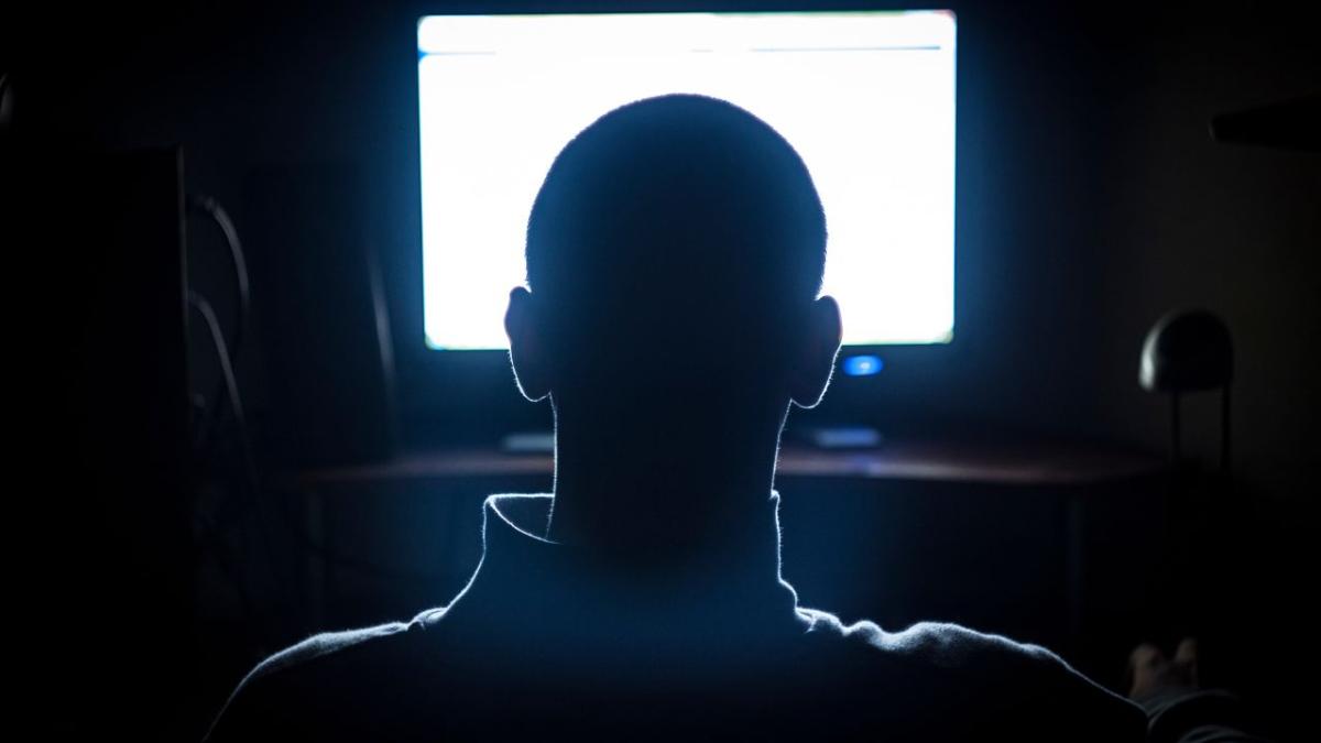 a stock image of a hacker, to represent a REvil hacker