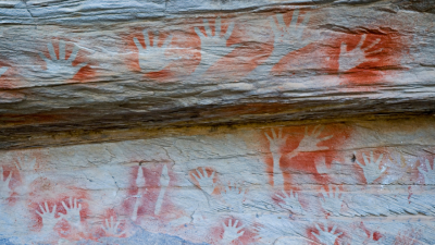 Influencers Slammed W/ Fines For ‘Selfish Selfies’ & Touching Indigenous Rock Art In Qld Park