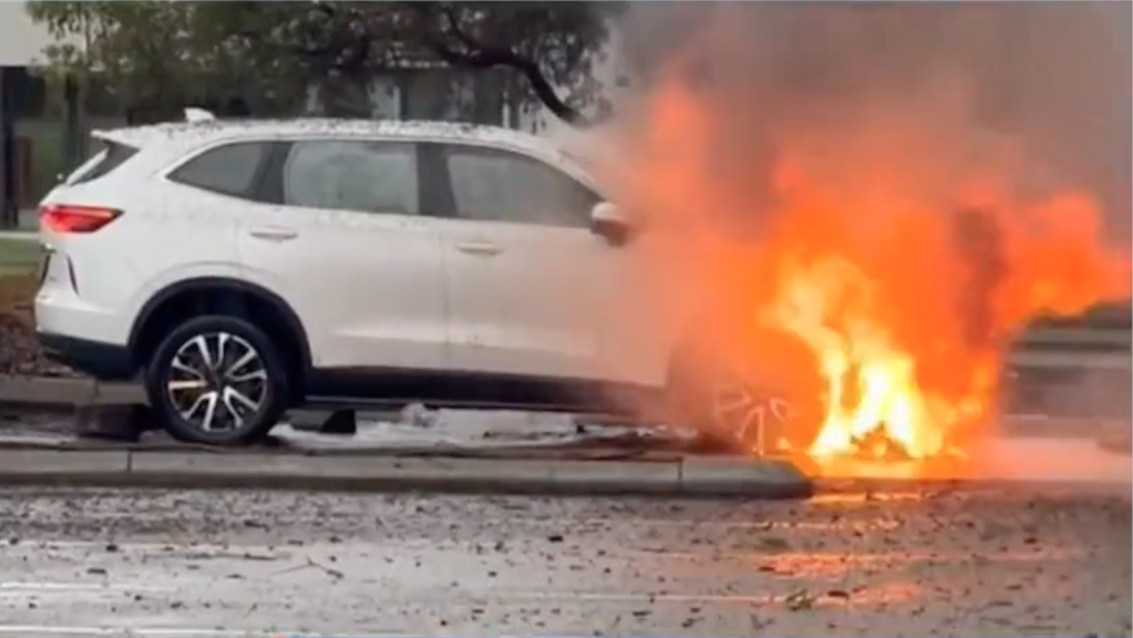 Photo of car that caught on fire after it was struck by lightning in Perth