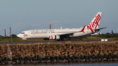 A Bali-Bound Plane Had To Land Mid-Flight After 3 Qld Men Allegedly Started Drinking & Vaping