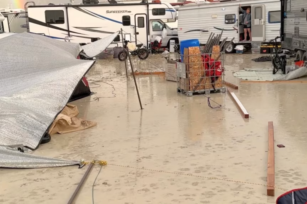 A soggy and flooded campsite at Burning Man 2023