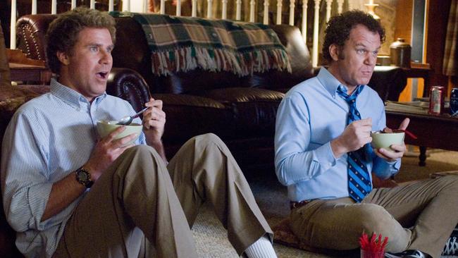 Scene from Step Brothers where two characters are sitting on the floor eating cereal