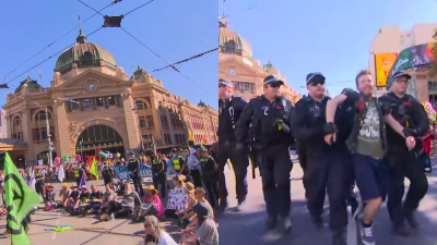 32 Climate Protestors Arrested By Police For Sitting In Intersection At Melbourne Train Station