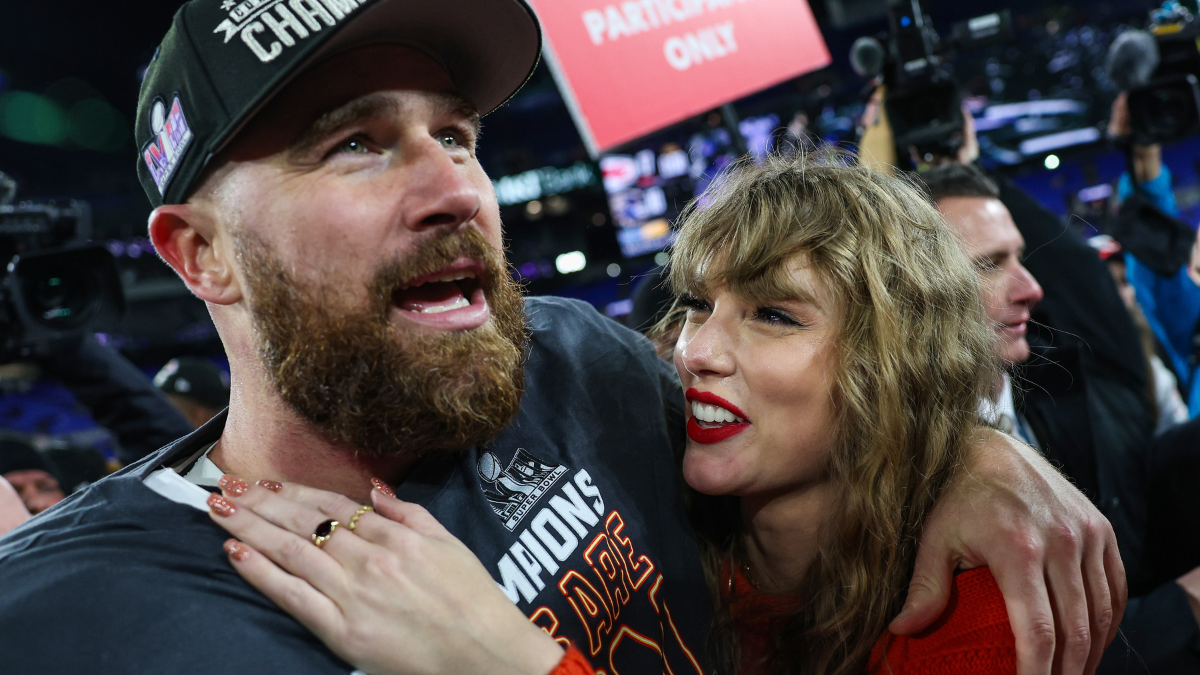 Travis Kelce and Taylor Swift on a football field
