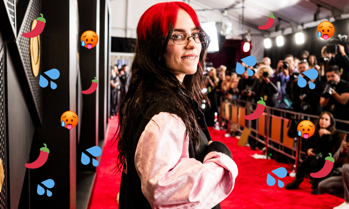 Billie Eilish on a red carpet with water, chilli and hot face emojis