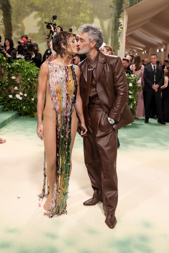 Rita Ora and Taika Waititi kissing at the Met Gala 2024