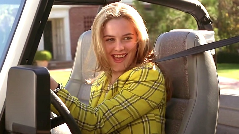 Cher from Clueless driving a jeep