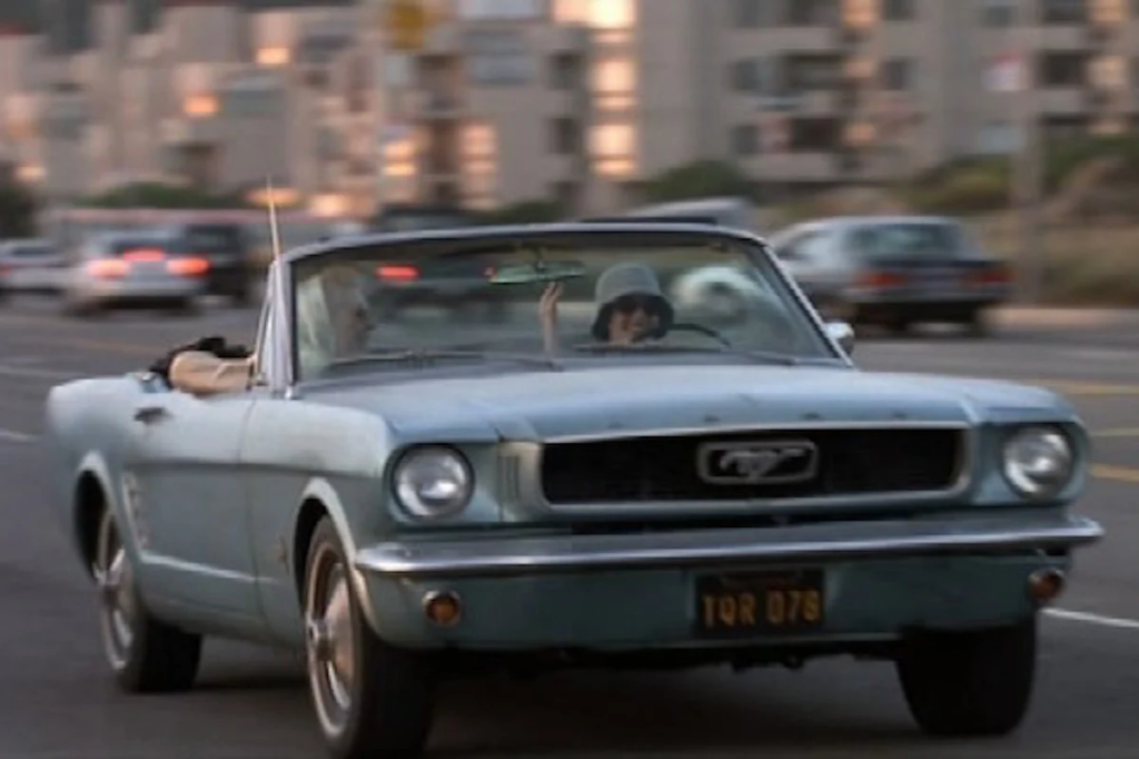 Anne Hathaway and Julie Andrews driving a Mustang in The Princess Diaries